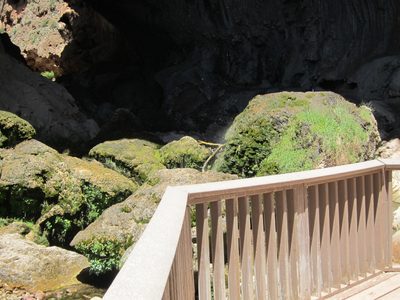 Moss covered rocks below the bridge, frequently blessed...